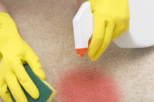Cleaners in Islington working in a bright residential interior