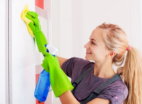 Cleaner preparing a one off cleaning service in an Islington flat