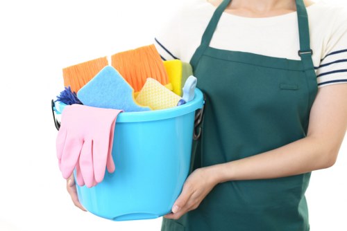 Cleaning team member using professional supplies during a job